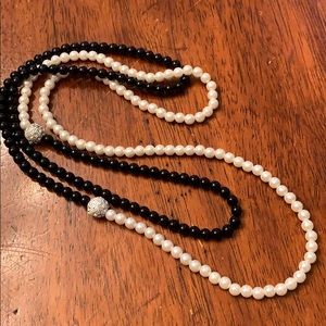 Black and white faux pearl necklace.